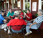 Enjoying the charm of the farmer's porch at The Main Lodge while celebrating a special occasion with friends and family - Click for larger image