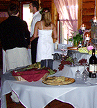 Wine, cheese, and crackers near one of the hearths in The Main Lodge - Click for larger image