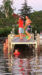 Kids playing in the water near the Jackson's Lodge dock (Click for larger image.)