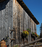 Flower boxes in bloom on the wood shed at family-friendly Jackson's Lodge and Log Cabins in Vermont's Northeast Kingdom- Fran Bigney photo