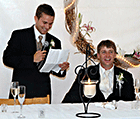 The best man shares a laugh with the bride and groom during his toast at a Jackson's Lodge tent wedding - Sarah Sanville Photography - Click for larger image.)