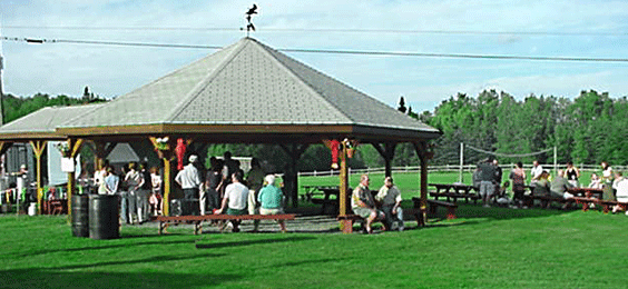 Family and friends celebrate a special occasion at The Gazebo at Jackson's Lodge, your Vermont Family-Friendly Vacation Destination